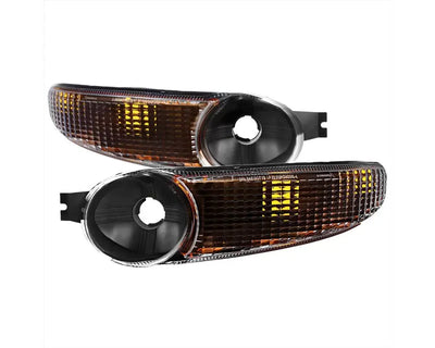 YUKON DENALI OE BUMPER LIGHT BLACK HOUSING CLEAR LENS - USES STOCK BULBS