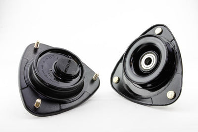 STRUT MOUNT HIGH DURO RUBBER +0.75DEG CASTER/0.5DEG CAMBER