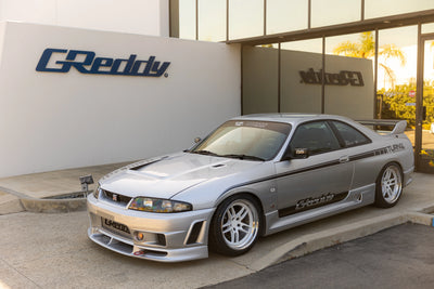 Greddy red auto part