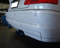 Megan Racing axle-back exhaust detail