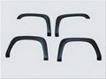 9905 SIERRA FENDER FLARES SET ROUND STYLE URETHANE