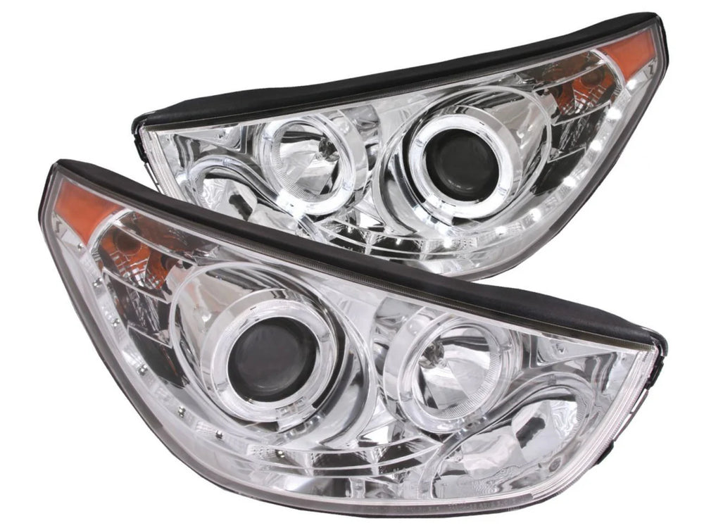 1014 TUCSON PROJECTOR W/2 HALOS CHROME CLEAR HEADLIGHTS
