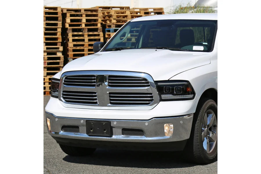 PROJECTOR HEADLIGHTS WITH BLACK HOUSING AND SMOKED LENS - SEQUENTIAL SWITCHBACK LED LIGHT BAR