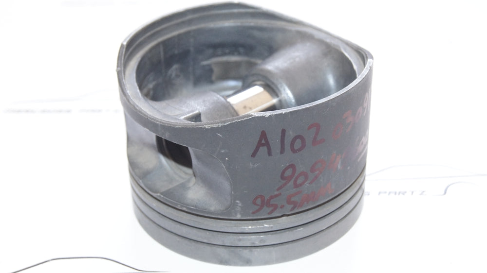 PISTON WITH RINGS