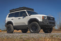 Rough Country FXS Hidden Winch Mount White SAE Fog Toyota Land Cruiser 4WD (24-26) 10747A