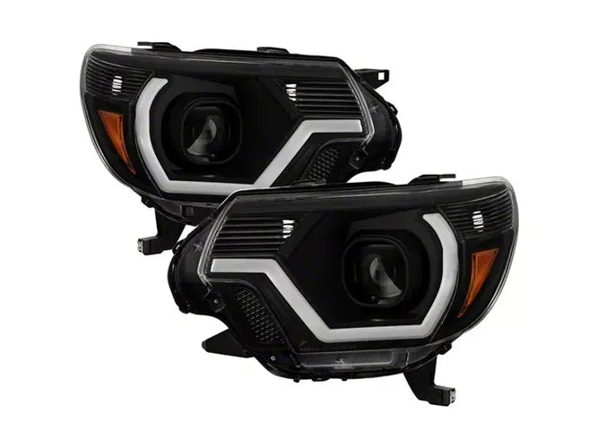xTune 12-15 Toyota Tacoma Projector Headlights w/ Light Bar - Black (PRO-JH-TTA12-LB-BK)