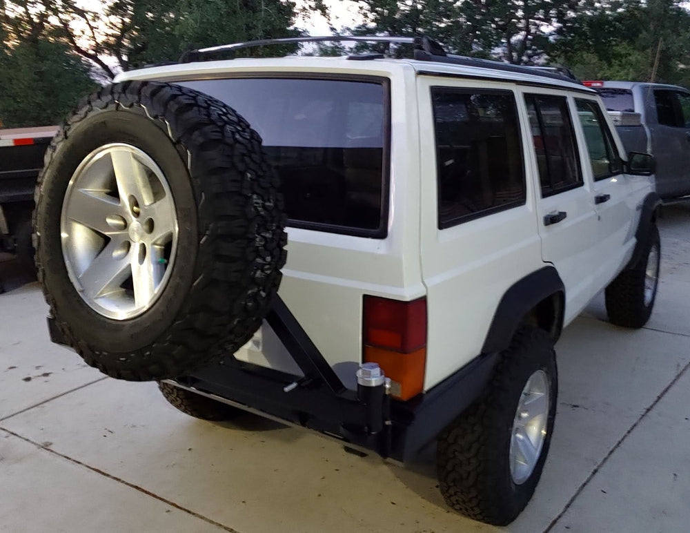 Rock Hard 4x4 Patriot Series Rear Bumper w Tire Carrier for Bushwacker Flares for Jeep Cherokee XJ 1984 - 2001 [RH-1013-B]