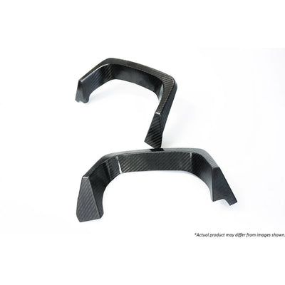 Revel carbon muffler