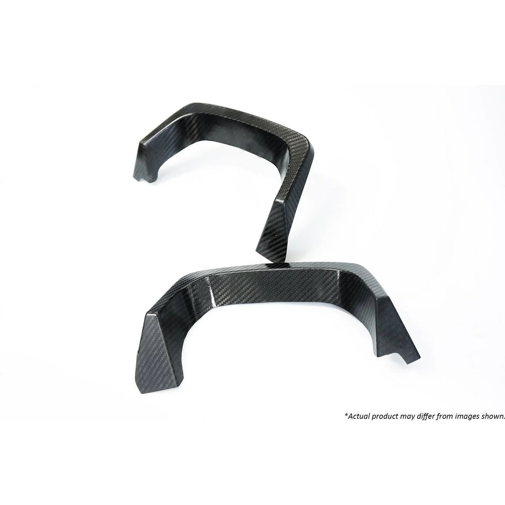 Revel carbon muffler