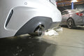 Megan Racing axle-back exhaust close-up