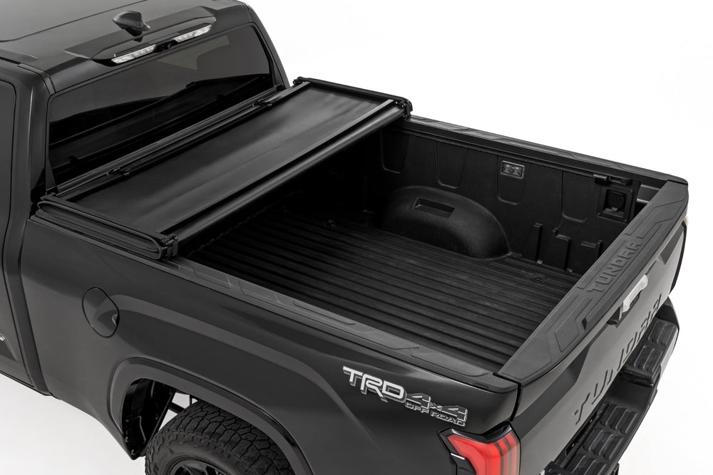 Rough Country Soft Tri-Fold Bed Cover 5 7 Bed with and w o OE Rail Toyota Tundra (22-26) 41419560A