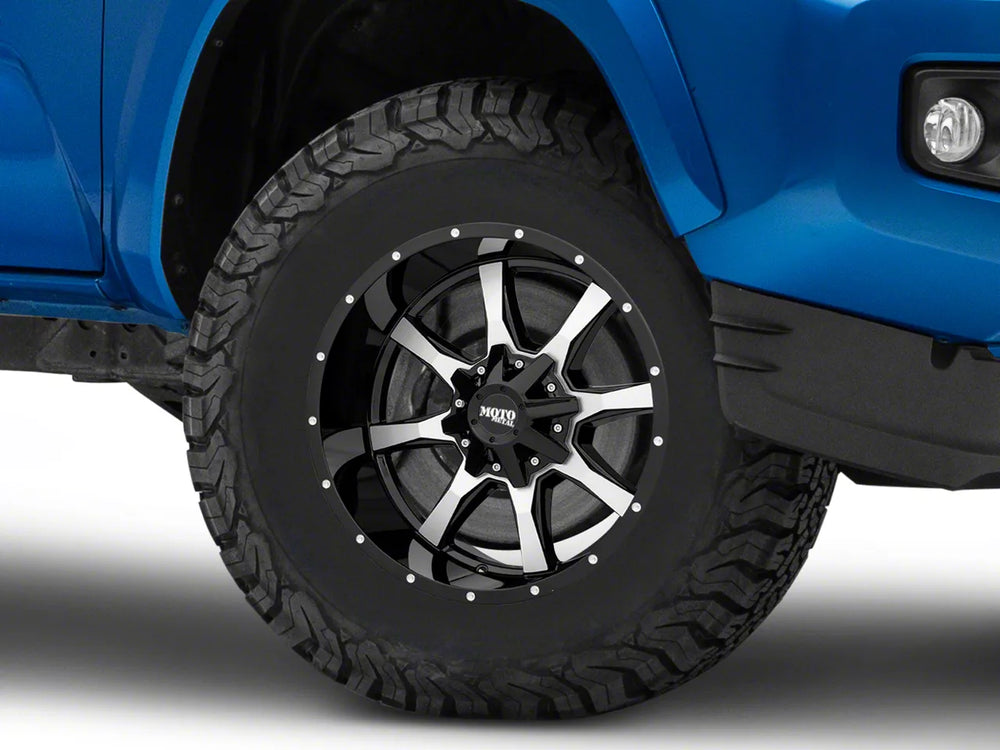 MO970 16x8 6x135.00/6x139.70 GLOSS BLACK W/ MACHINED FACE (0 mm)