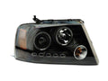 Raxiom 04-08 Ford F-150 Dual LED Halo Projector Headlights- Black Housing (Clear Lens)
