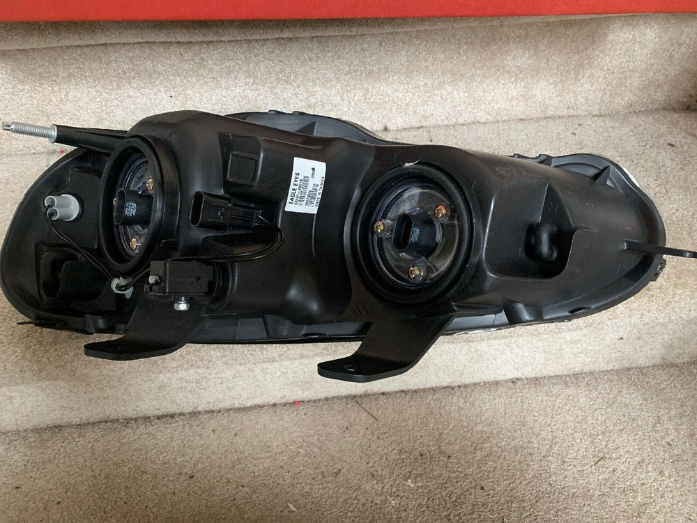 RH HEADLAMP ASSY COMPOSITE; 2DR COUPE; SEBRING 0305
