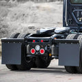 SPRING-LOADED MUD FLAP HANGER