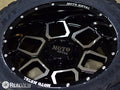 MO981 20X10 6X135 G-BLK MACH -24MM