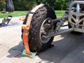 WHEEL TIE-DOWN FOR ATV LAWNMOWERS
