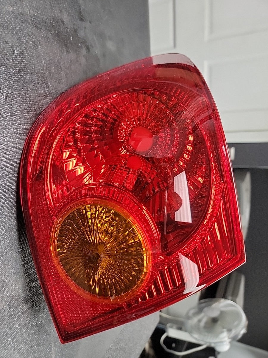LH TAILLAMP ASSY; COROLLA 0304