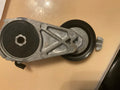 AUTOMATIC BELT TENSIONERS