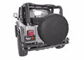 This black tire cover from Rugged Ridge fits 30-32 inch spare tires.