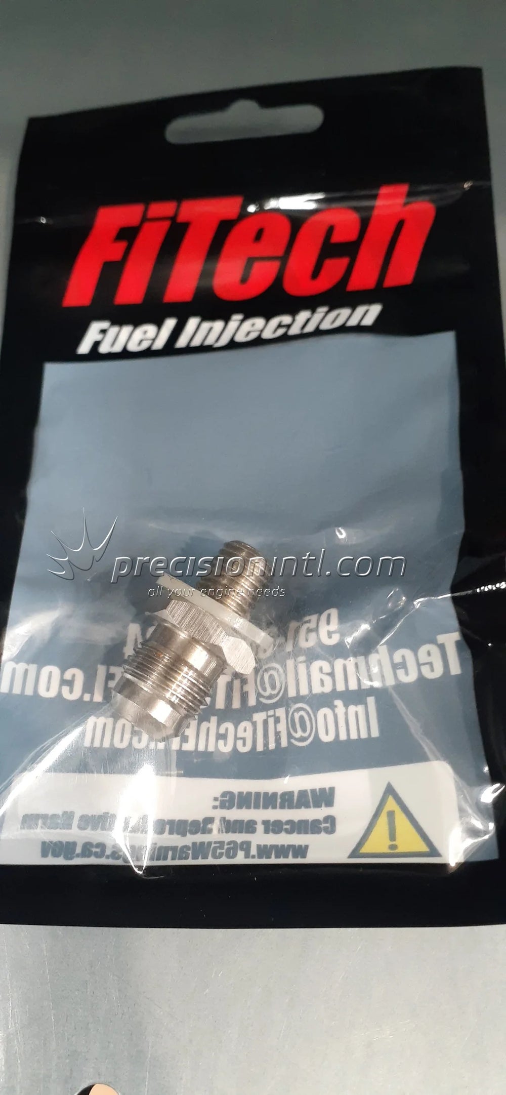 THROTTLE BODY RETURN PORT10 X 1.25 TO MALE AN6 FITTING