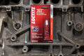 Loctite Corporation red auto part