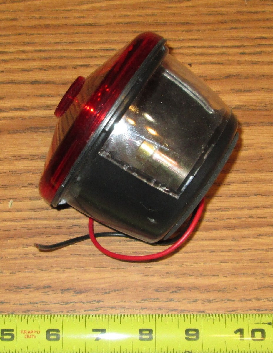 TAIL LIGHT ROUND; DRIVER