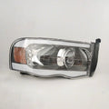 Raxiom 02-05 Dodge RAM 1500/2500/3500 Axial Series Proj Hdlts/LED Bar- Black- Clear Lens