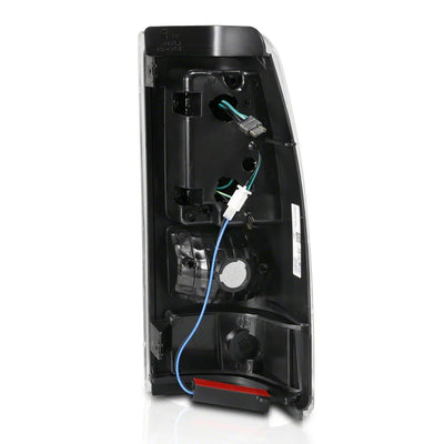 Raxiom 03-06 Chevrolet Silverado 1500 Fleetside Axial Series LED Tail Lights- Black - Clear Lens