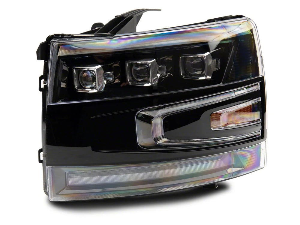 Raxiom 07-14 Chevrolet Silverado 2500 HD/3500 HD LED Projector Headlights- Black - Clear Lens