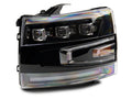 Raxiom 07-14 Chevrolet Silverado 2500 HD/3500 HD LED Projector Headlights- Black - Clear Lens