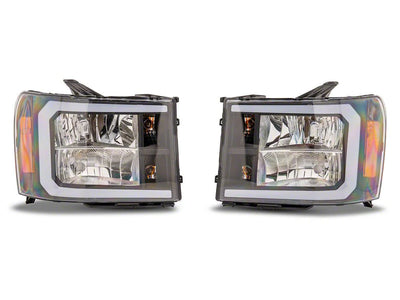 Raxiom 07-13 Chevrolet Sierra 1500 Axial Series Headlights/Seq LED Bar- Black- Clear Lens