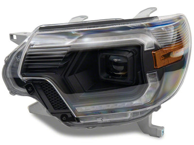 Raxiom 12-15 ToyotaTacoma Axial Series Switchback Projector Headlights- Black Housing- Clear Lens