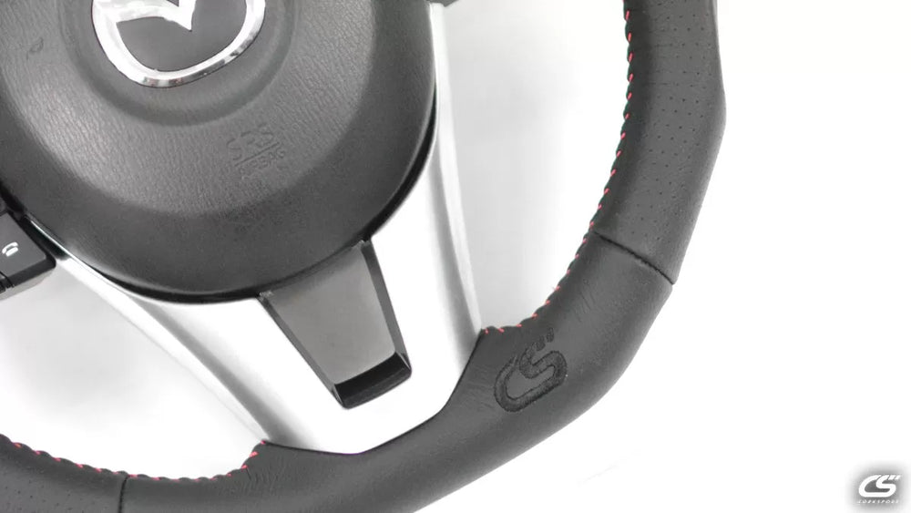 Perforated Leather Steering Wheel with Red Stitching