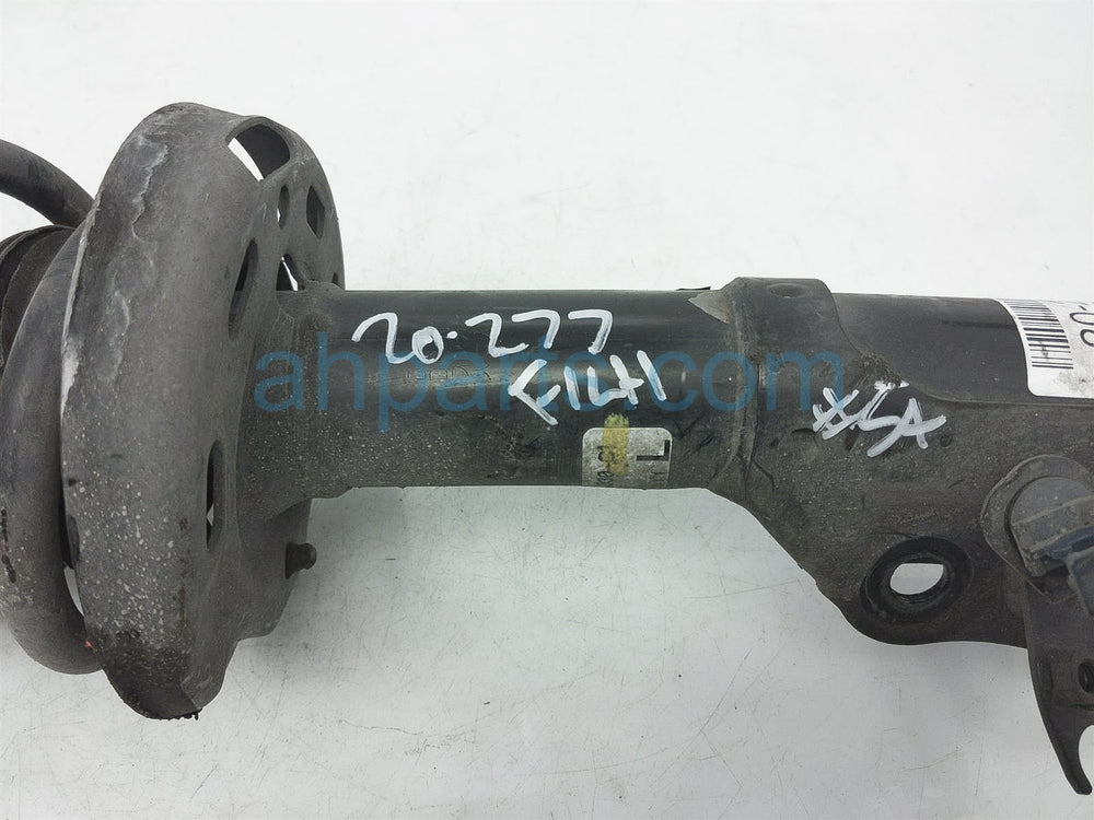 Genuine Strut Assembly, Driver Side