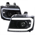 PROJECTOR HEADLIGHT - GLOSS BLACK HOUSING - CLEAR LENS WITH AMBER REFLECTORS