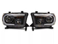 Raxiom 07-13 Toyota Tundra Axial Projector Headlights w/ SEQL LED Bar- Blk Housing (Clear Lens)
