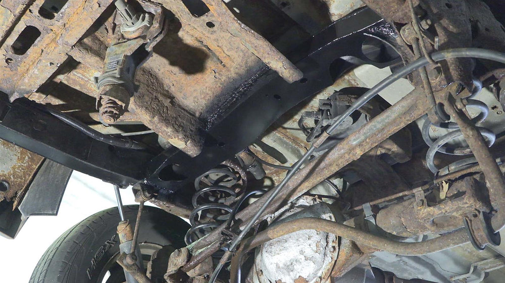 FORWARD SPARE TIRE CROSSMEMBER