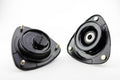 STRUT MOUNT HIGH DURO RUBBER +0.75DEG CASTER/0.5DEG CAMBER