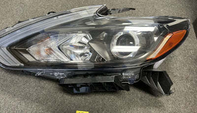 CAPA NS ALTIMA SDN 1617 HEADLIGHT ASSY HALOGEN SMOKE LH