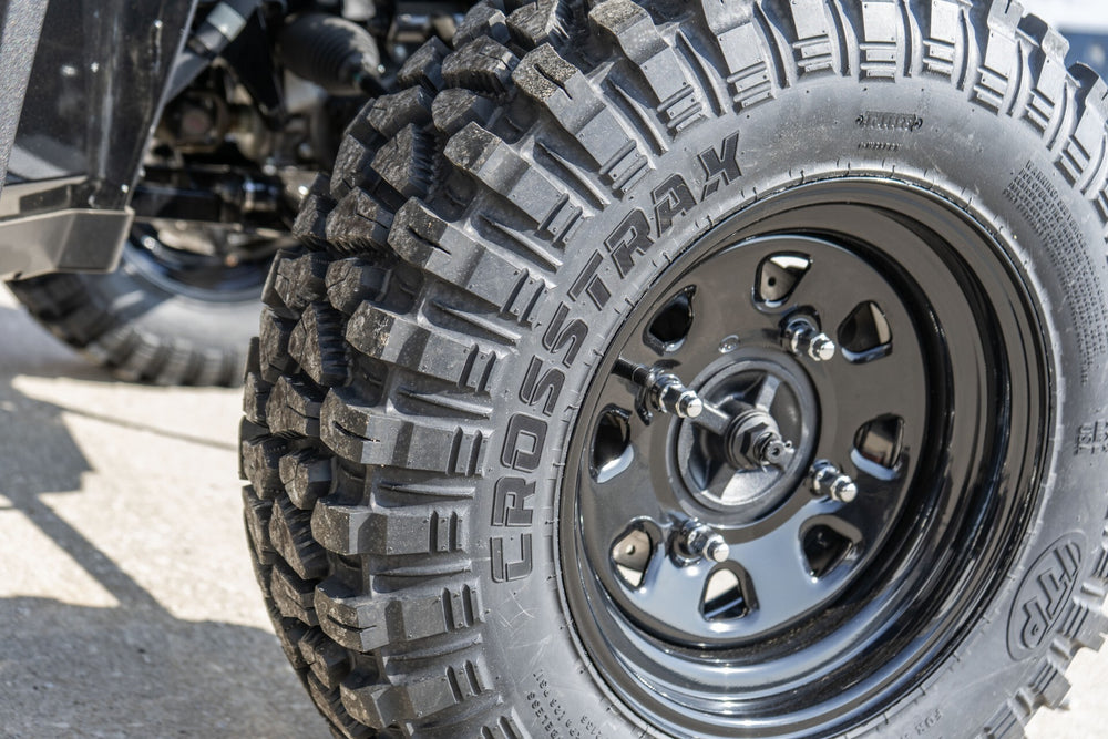 TIRE CROSSTRAX 25X8R-12  8PLY RADIAL