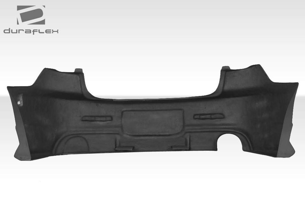 2004-2009 Mazda 3 4DR Duraflex I-Spec Body Kit - 6 Piece - Includes I-Spec Front Bumper Cover (104479) I-Spec Rear Bumper Cover (104480) I-Spec Side Skirts Rocker Panels (104481) I-Spec Grille (104482) I-Spec Rear Wing Trunk Lid Spoiler (104483)