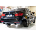 AWE Tuning axle-back exhaust close-up